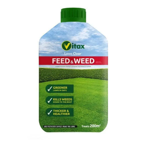 Vitax Lawn Clear AutumnWeed & Feed bottle with green grass and blue sky design on a white background