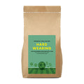 Kraft paper bag with a green 'Hard Wearing Grass Seed' from The Relentless Gardener on a white background
