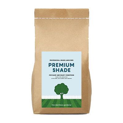 Kraft paper bag with 'Premium Shade Grass Seed' label on a white background