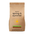 Brown paper bag with 'signature spring & summer Lawn feed' by The Relentless Gardener text and sun graphic on a white background