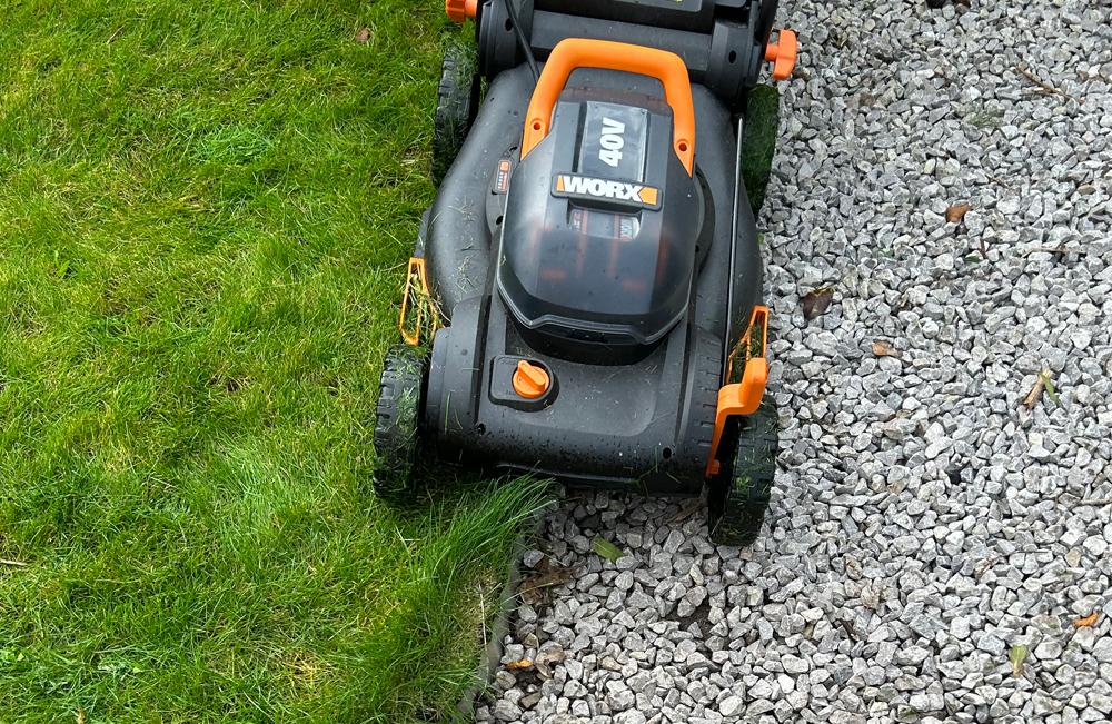 Cutting Grass on Edge of lawn